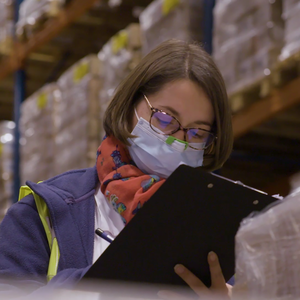 woman in a healthcare warehouse