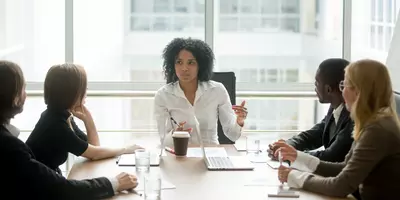 woman leading a meeting