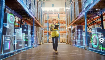 Lady preparing orders in an automated warehouse 