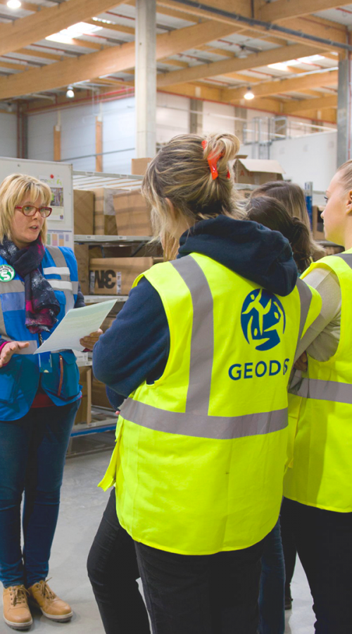 Employee in safety jacket