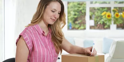 woman returning a parcel